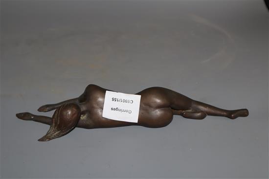 A bronze of a sleeping recumbent nude lady, length 28cm